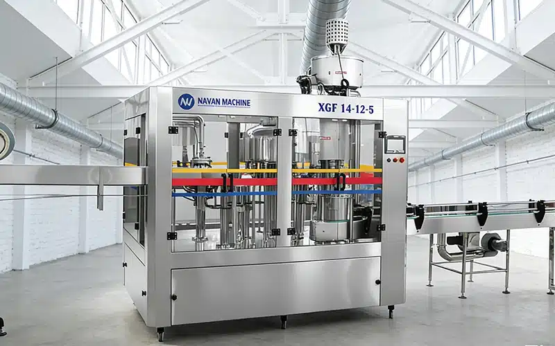 Monoblock machine combining rinsing, filling, and capping for bottled water production.